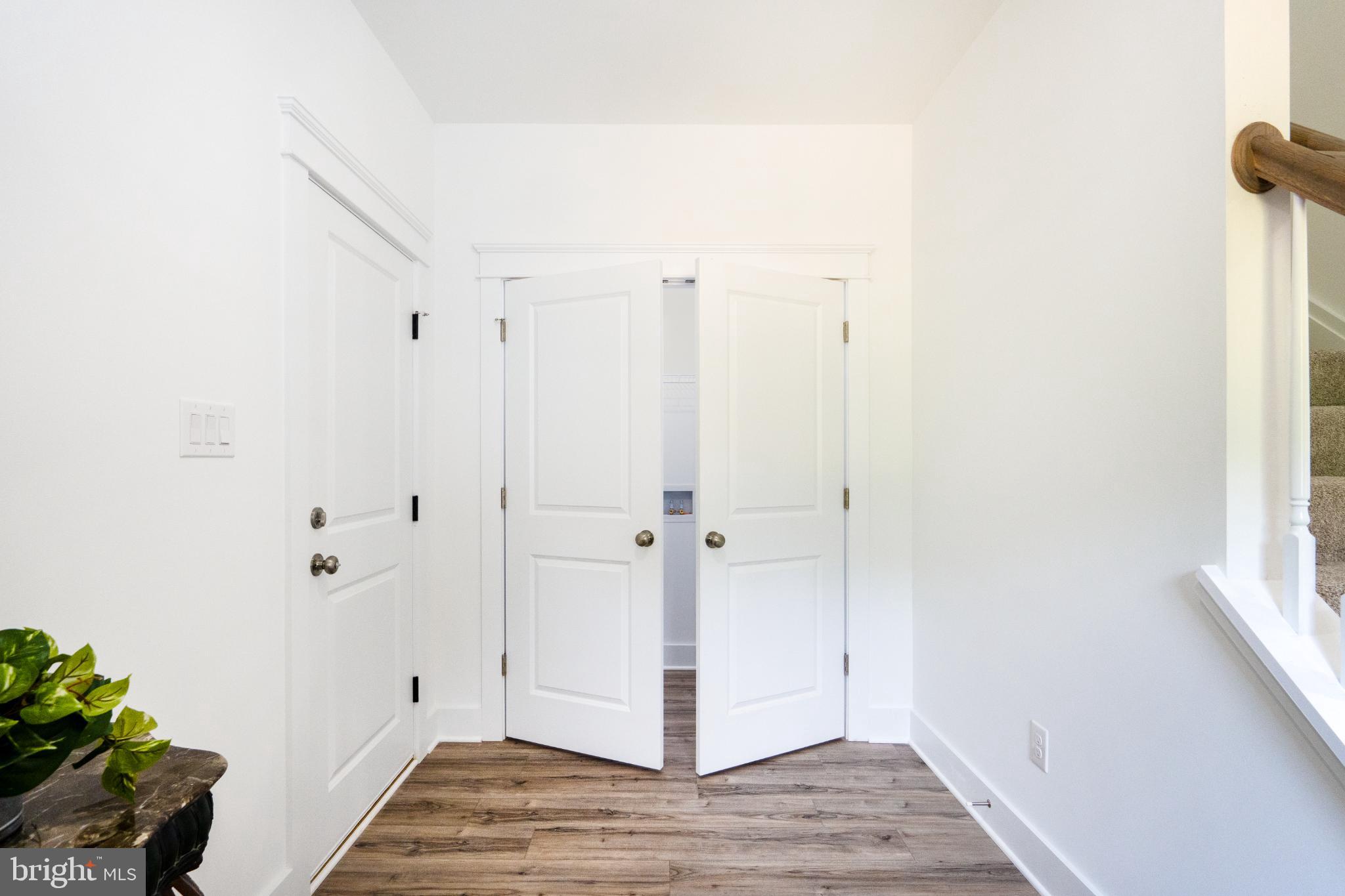 723 Rainbow Ridge Bumpass, VA 23024 - Photo 29 of 60 a view of a hallway with wooden floor and closet