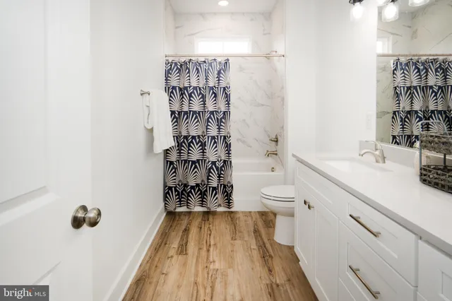 a bedroom with a bed and a chair