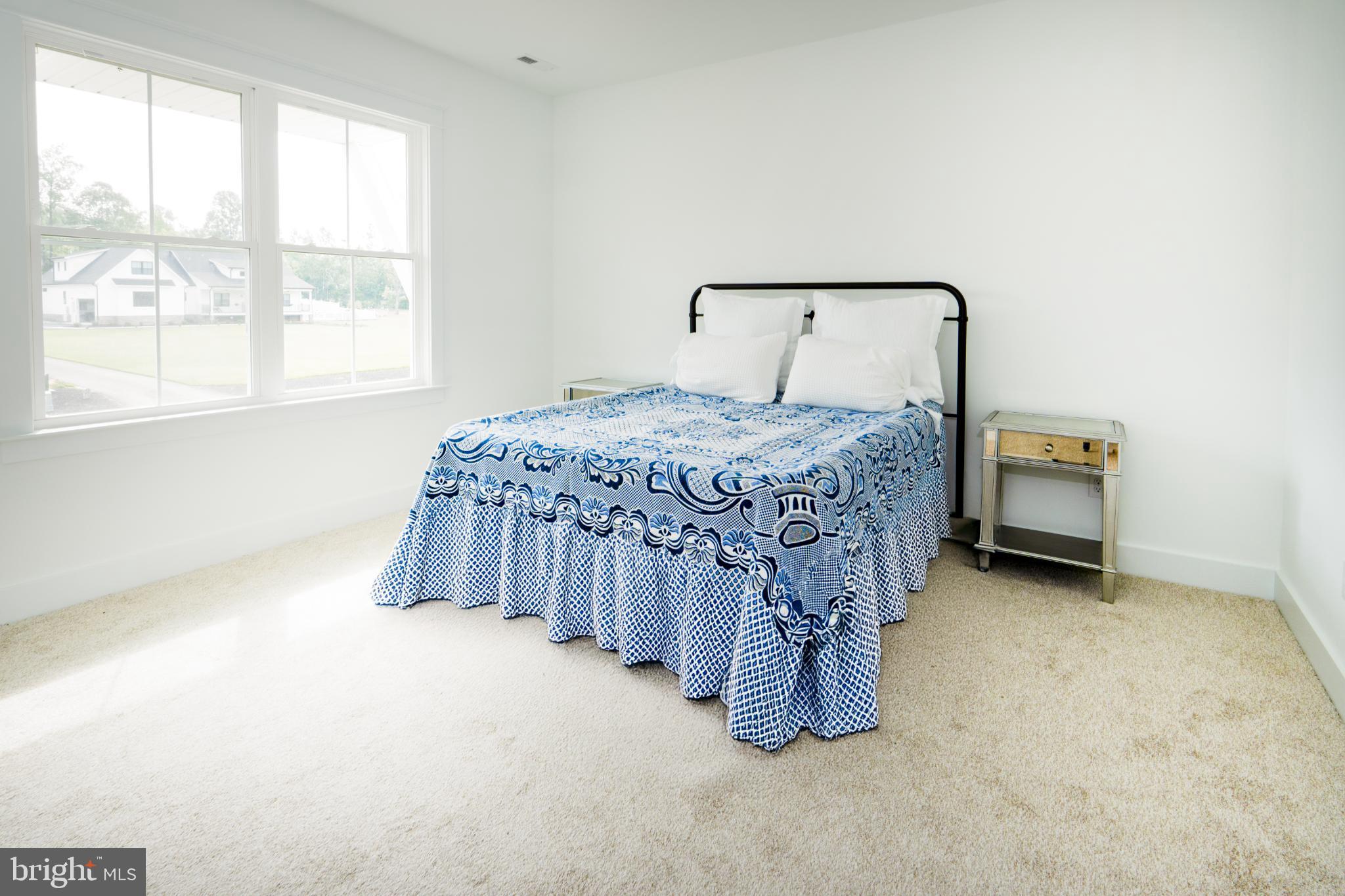 723 Rainbow Ridge Bumpass, VA 23024 - Photo 37 of 60 a bedroom with a bed and a window