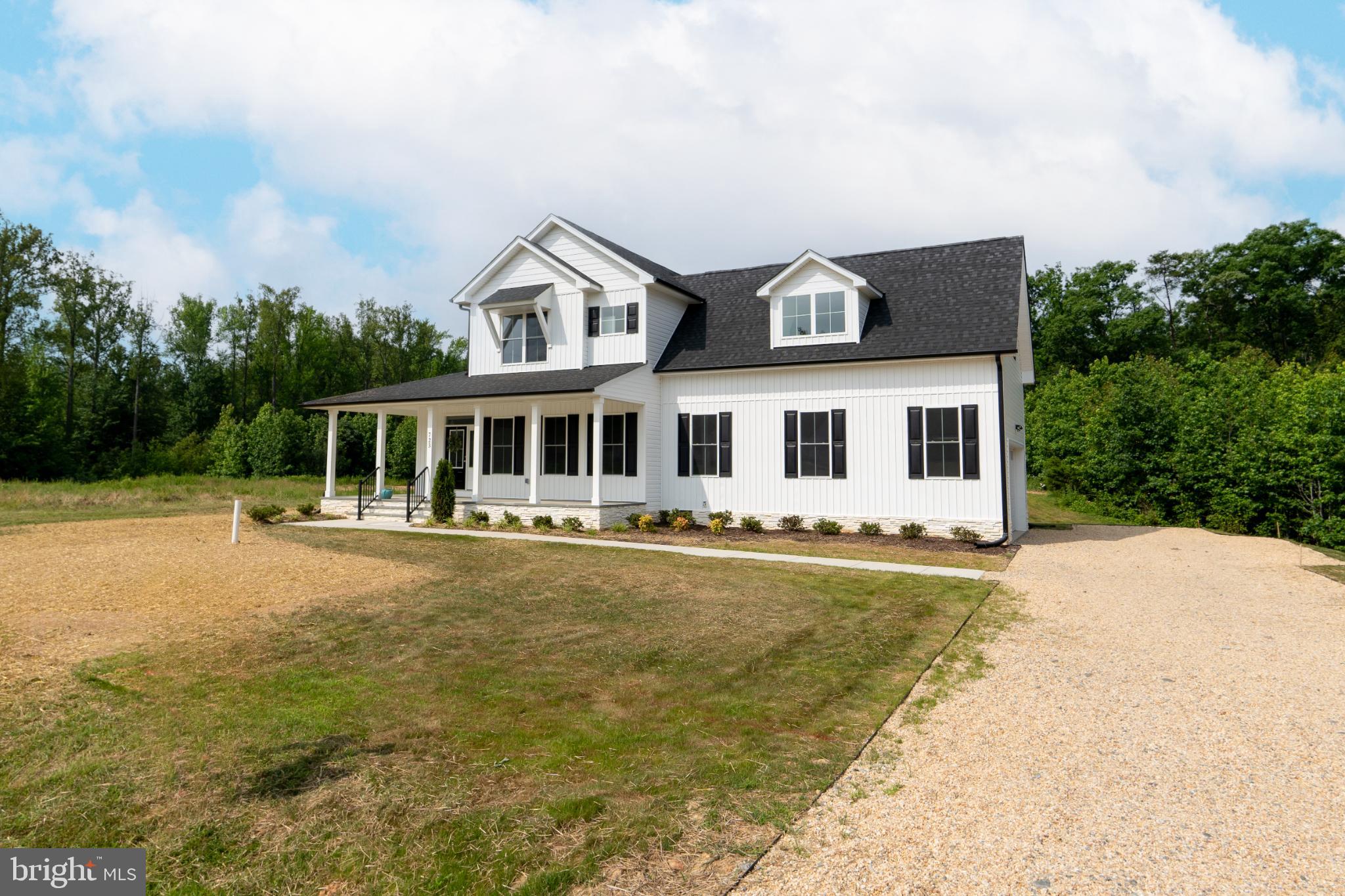 723 Rainbow Ridge Bumpass, VA 23024 - Photo 40 of 60 a front view of house with yard and swimming pool