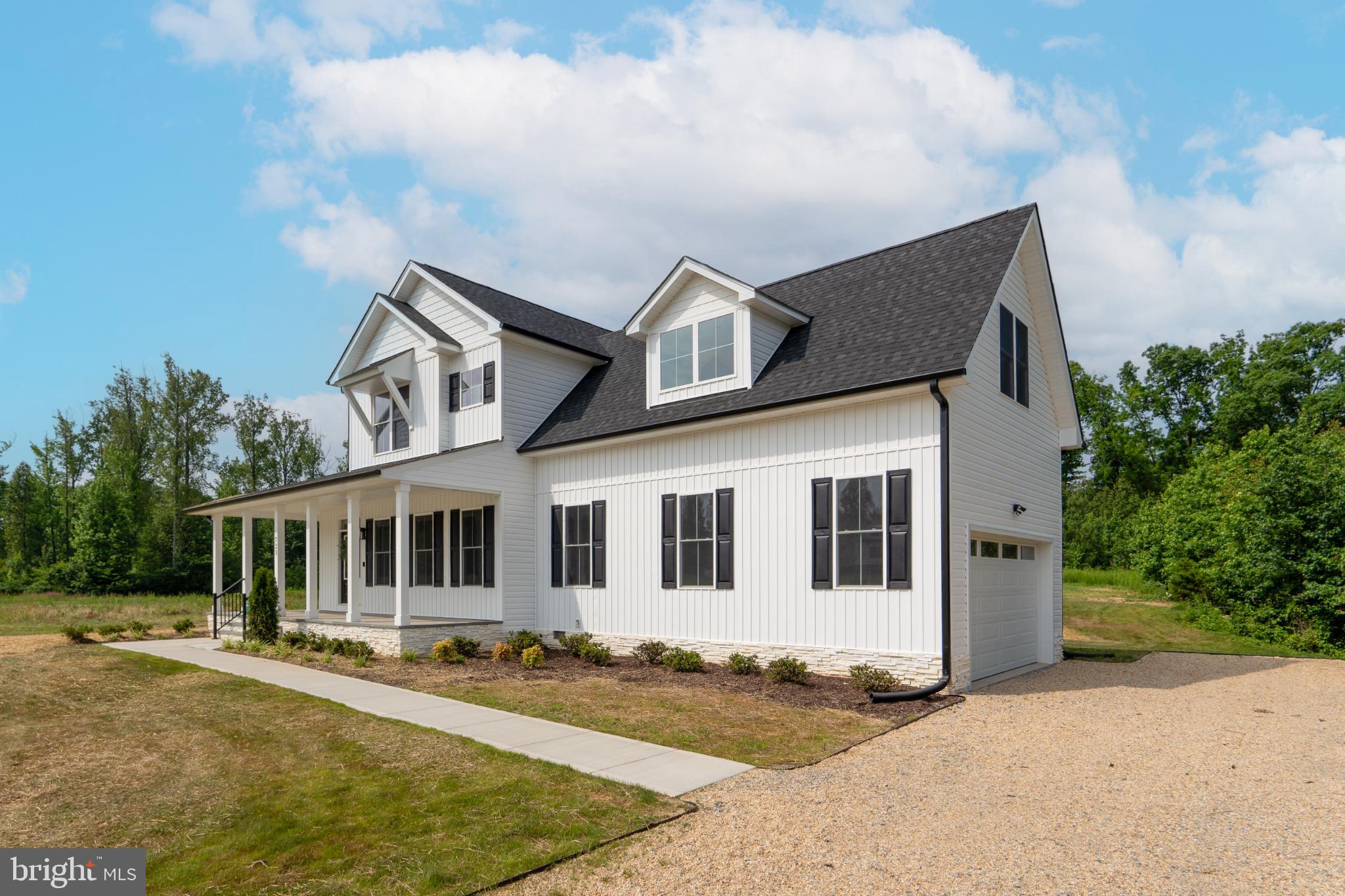 723 Rainbow Ridge Bumpass, VA 23024 - Photo 48 of 60 a front view of a house with a yard
