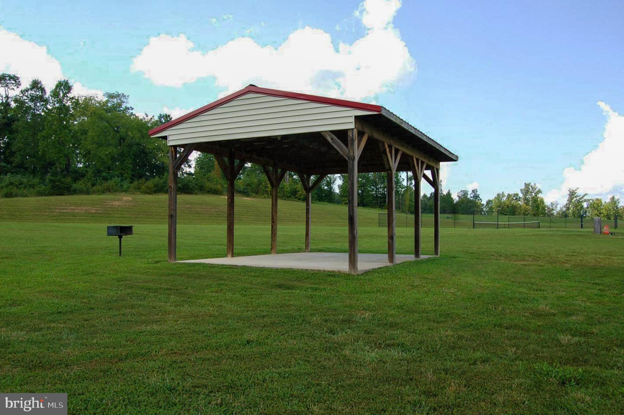 723 Rainbow Ridge Bumpass, VA 23024 - Photo 52 of 60 a view of a house with a yard