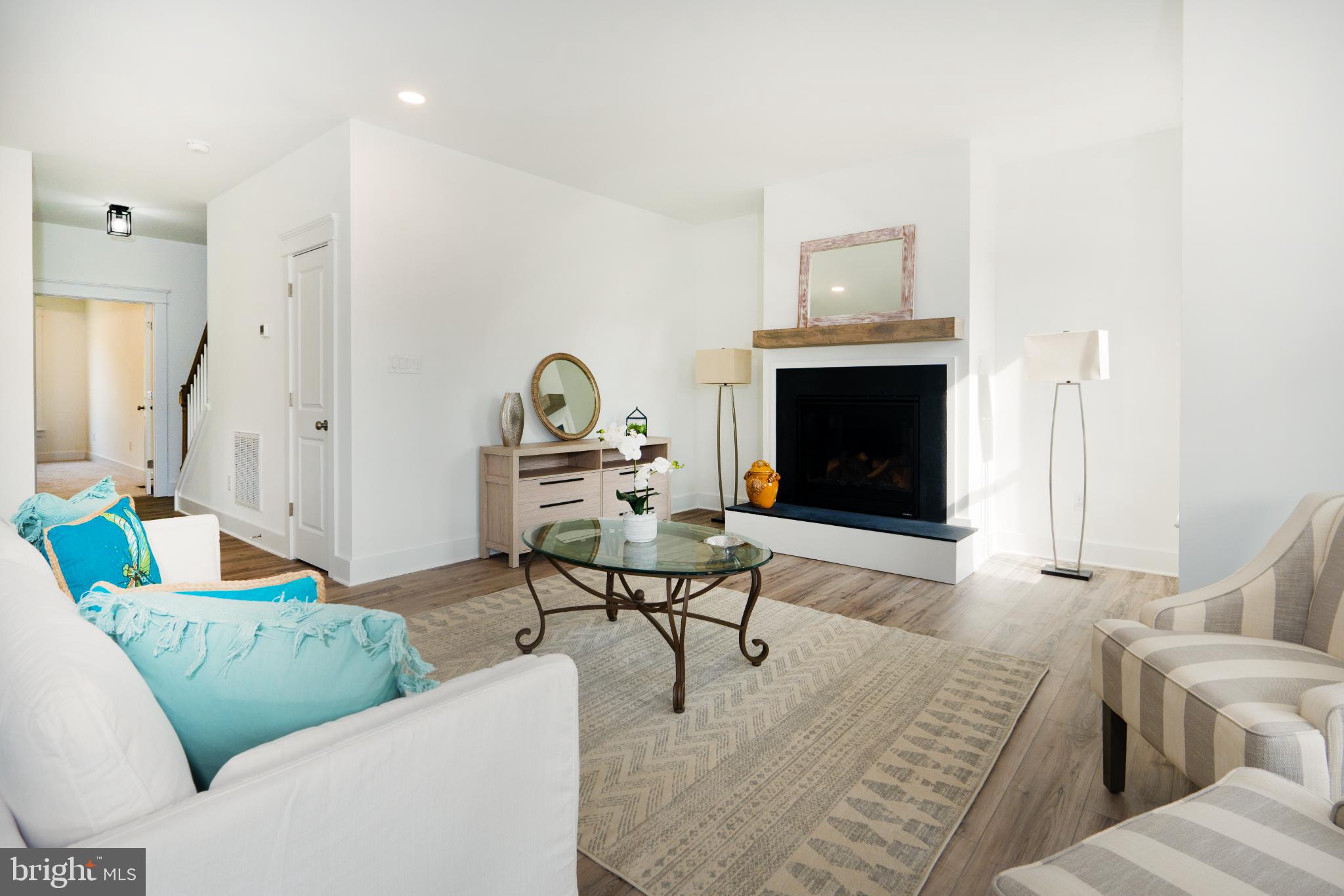 723 Rainbow Ridge Bumpass, VA 23024 - Photo 8 of 60 a living room with furniture and a fireplace