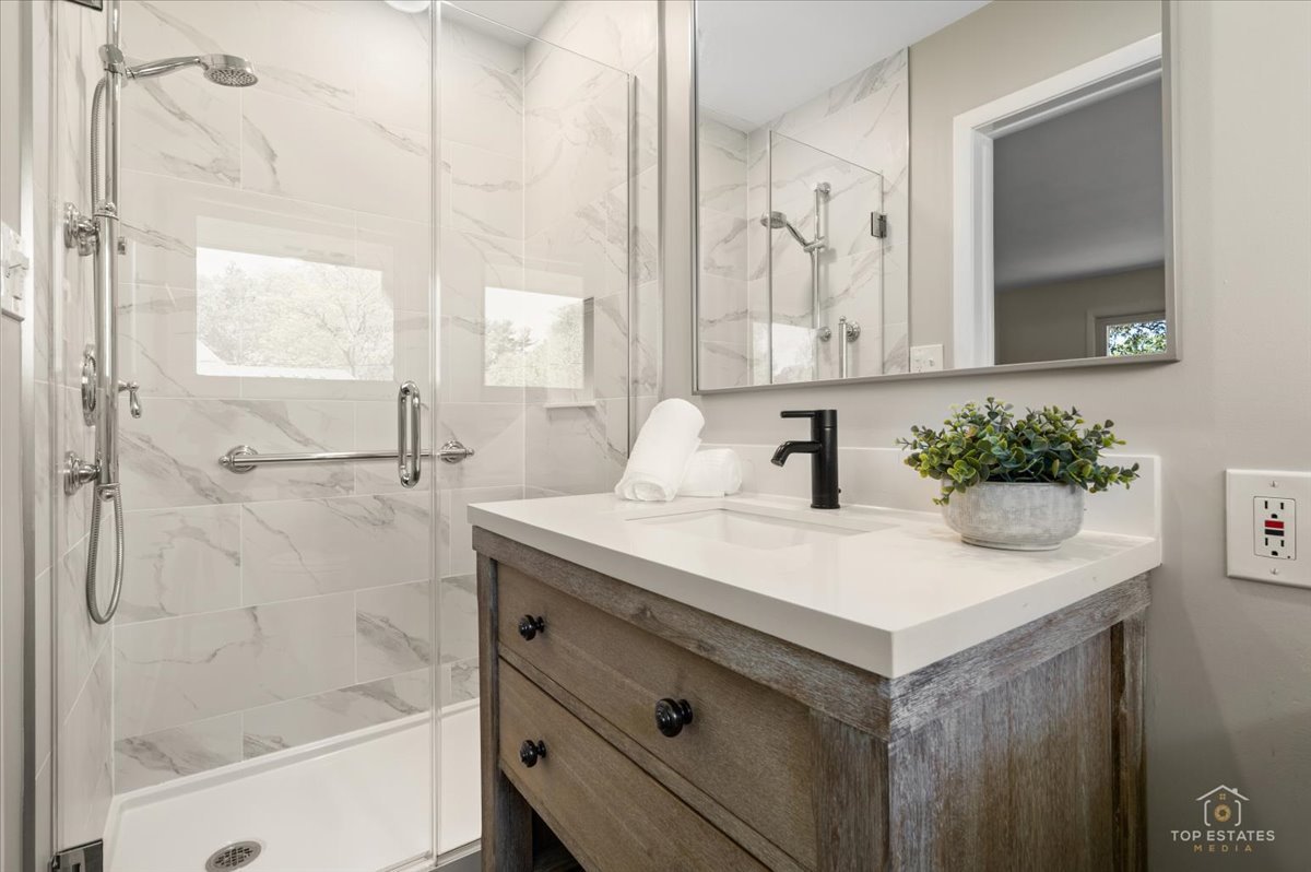 326 Charles Street Geneva, IL 60134 - Photo 17 of 33 a bathroom with a sink and a mirror