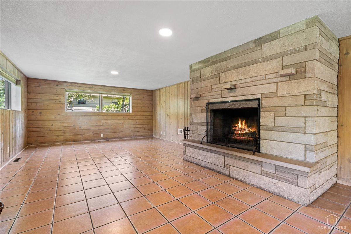 326 Charles Street Geneva, IL 60134 - Photo 23 of 33 a living room with a fireplace