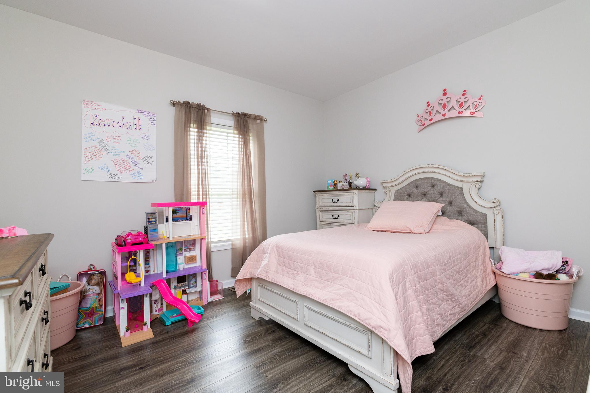 33 Sinker Drive Inwood, WV 25428 - Photo 19 of 31 a bedroom with a bed and wooden floor