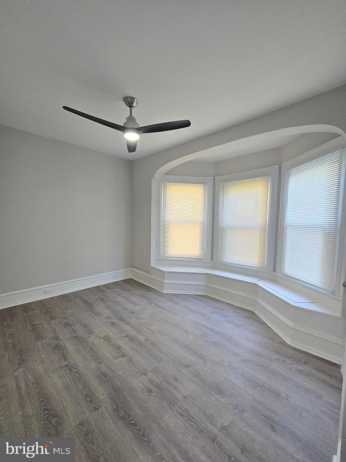 5211 Ridge Avenue, Unit 2 Philadelphia, PA 19128 - Photo 12 of 23 wooden floor in an empty room with a window