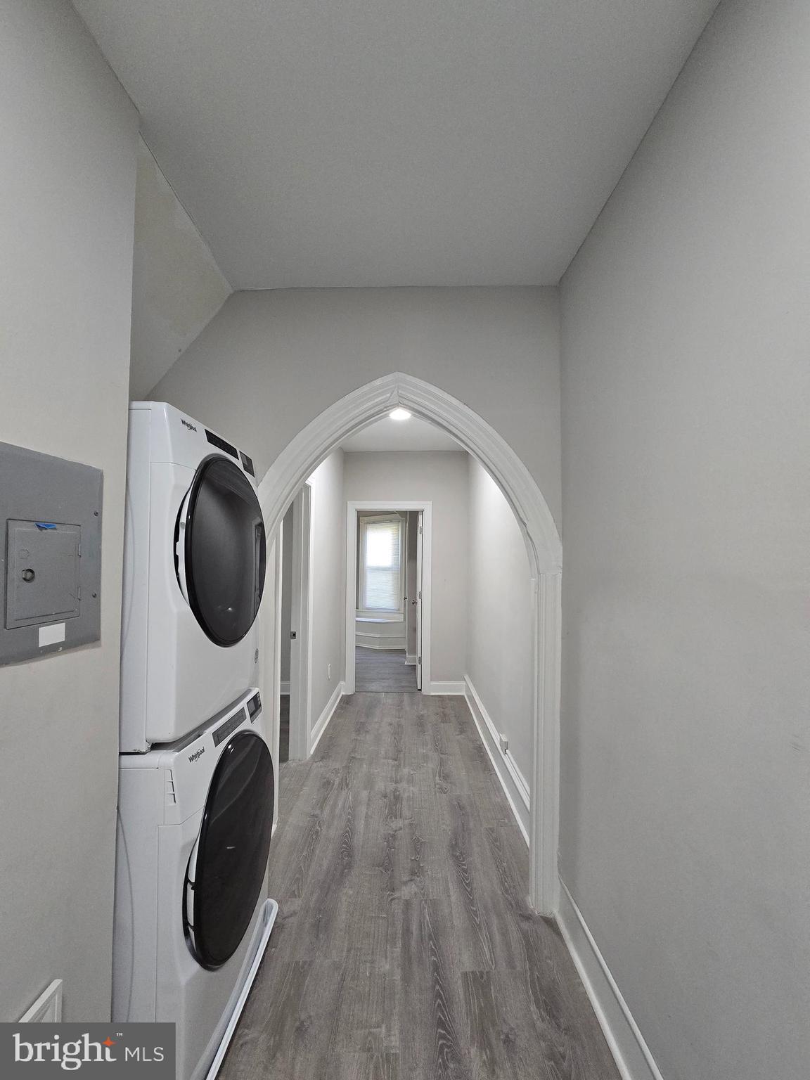 5211 Ridge Avenue, Unit 2 Philadelphia, PA 19128 - Photo 14 of 23 a view of a hallway with washer and dryer