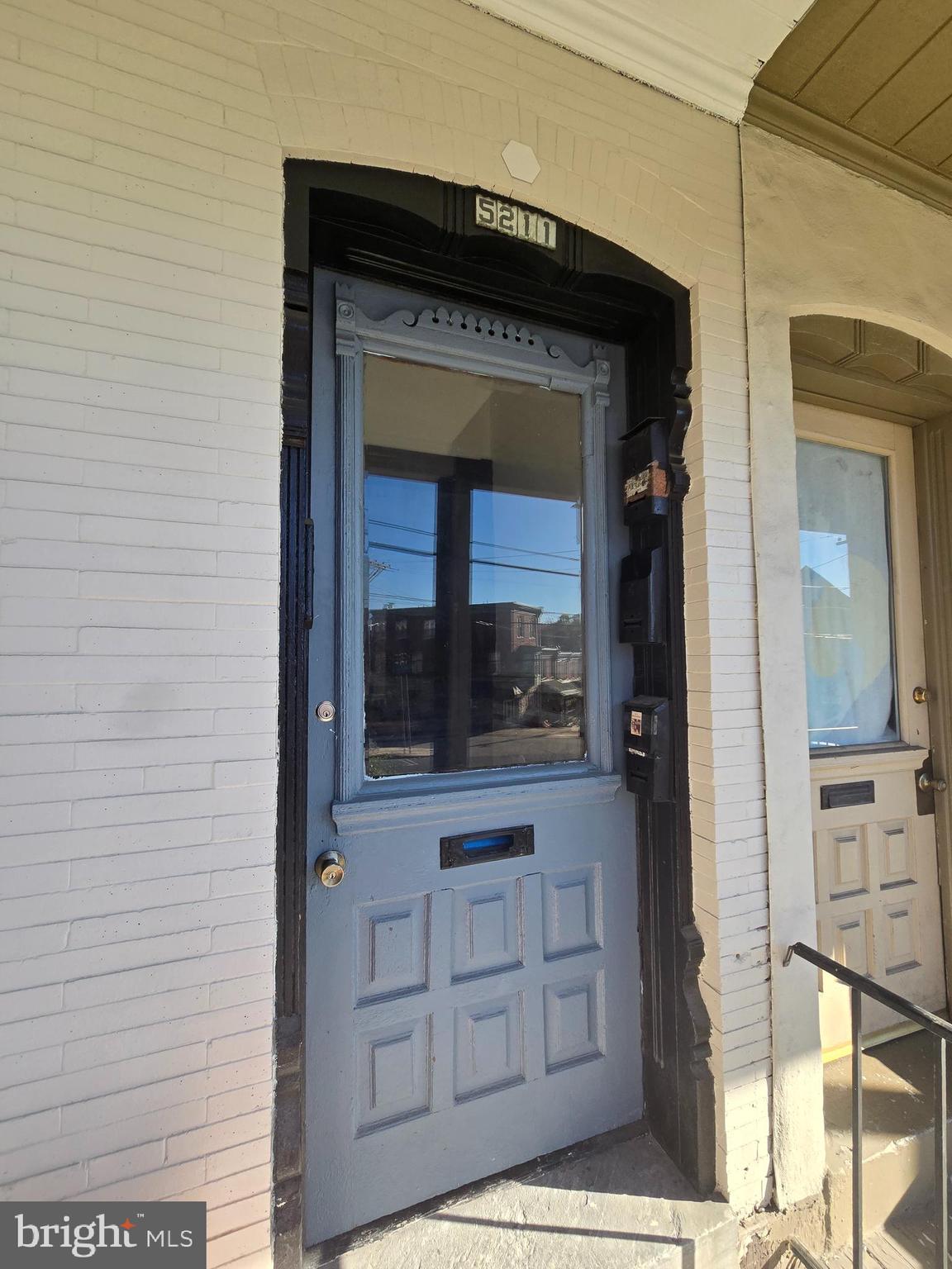 5211 Ridge Avenue, Unit 2 Philadelphia, PA 19128 - Photo 18 of 23 a hallway with a fireplace