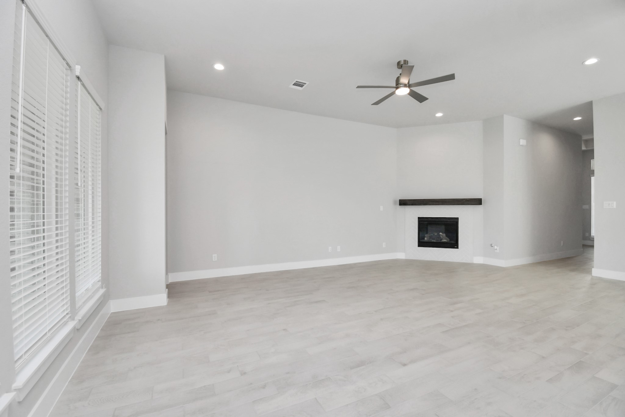 3031 Native Spg Drive Spring, TX 77373 - Photo 14 of 30 Take another glimpse into the heart of the home with this additional view of the family room—a sprawling space ready to accommodate all your gatherings. Sample photo of completed home with similar floor plan. Actual colors and selections may vary.