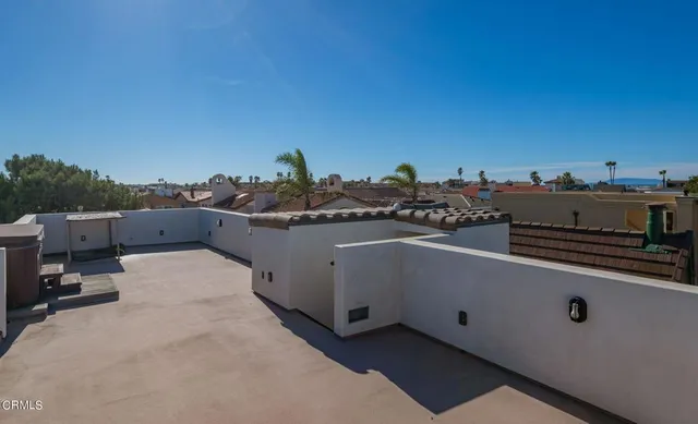 a terrace with a bench