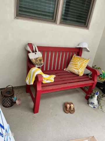 a wooden bench sitting in a room