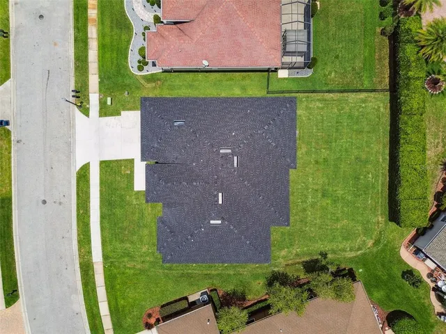 a view of a garden with houses