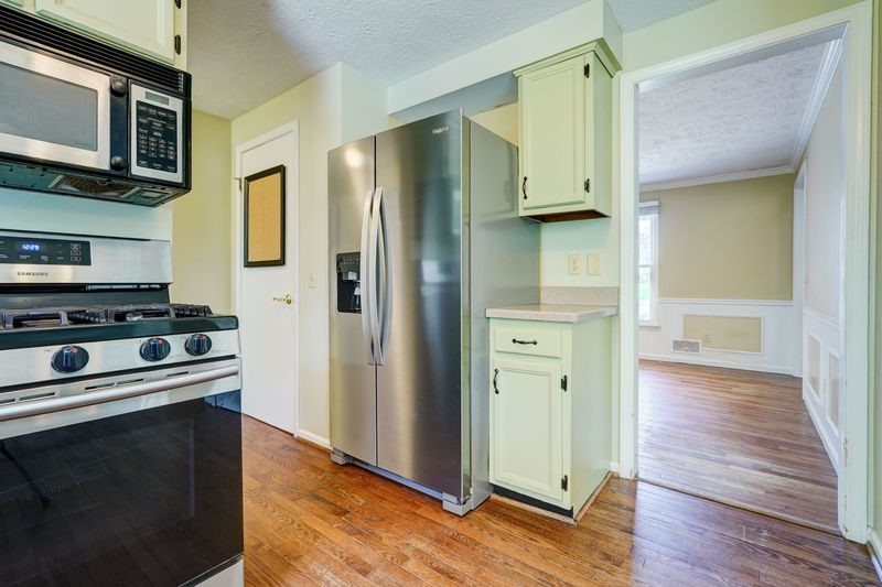 44 Latchmere Drive Victor, NY 14564 - Photo 19 of 50 FROM THE KITCHEN LOOKING TOWARD THE BACK HALL TO T