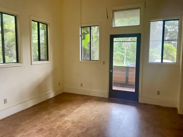 an empty room with windows