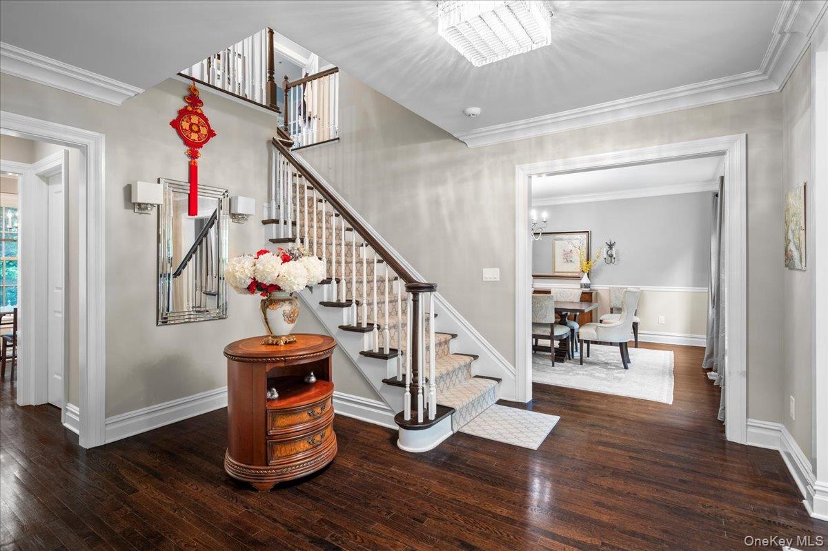 7 Harcourt Road Scarsdale, NY 10583 - Photo 3 of 34 a view of entryway dining room and hall with wooden floor