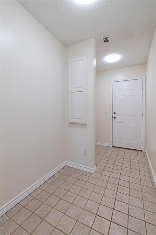 3750 Castlegate Drive Paris, TX 75462 - Photo 17 of 20 a view of an empty room and window