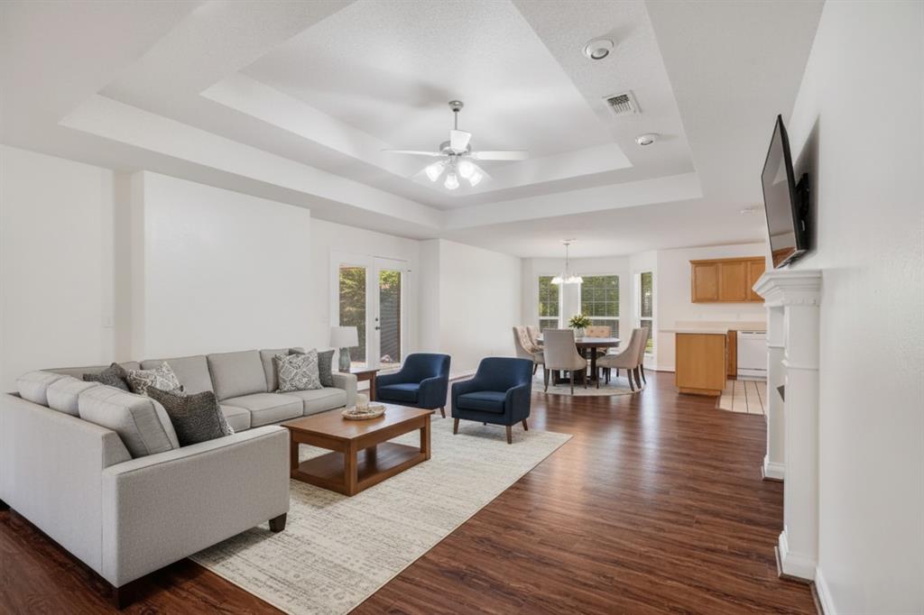 3750 Castlegate Drive Paris, TX 75462 - Photo 4 of 20 a living room with furniture wooden floor and a flat screen tv