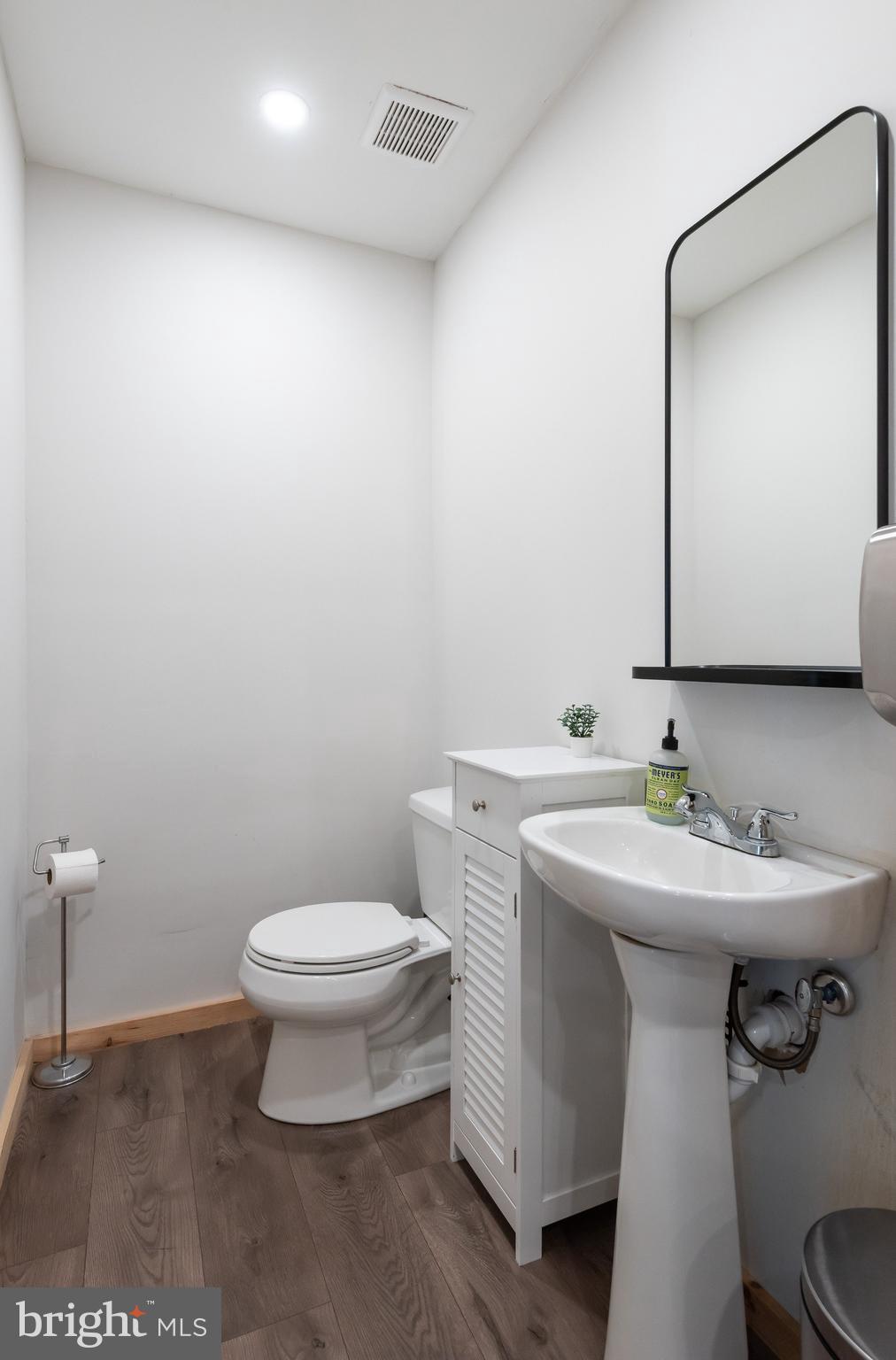 723 Saylors Mill Road Spring City, PA 19475 - Photo 60 of 74 a bathroom with a toilet a sink and mirror