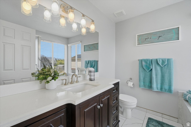 5576 South 4100th Street West Roy, UT 84067 - Photo 21 of 35 Remodeled bathroom in primary bedroom