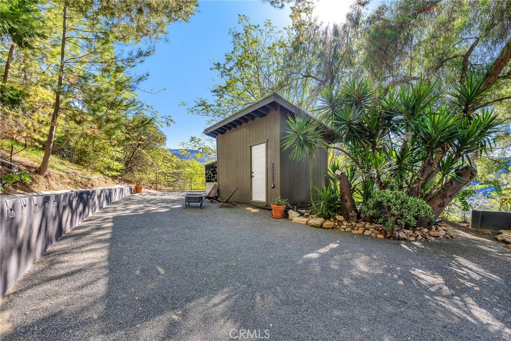 24301 Sylvan Glen Road Calabasas, CA 91302 - Photo 51 of 64 a view of a house with a street