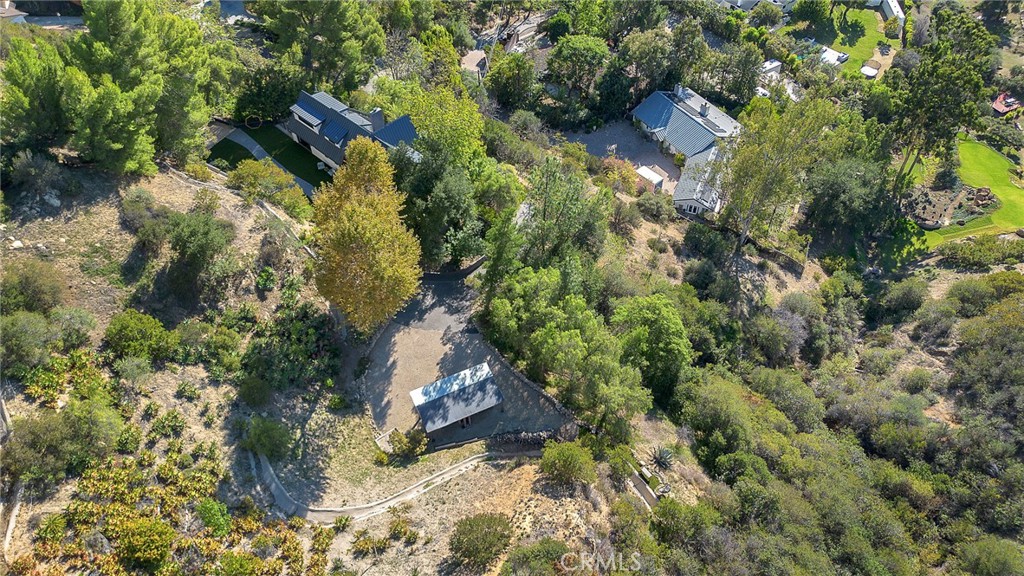 24301 Sylvan Glen Road Calabasas, CA 91302 - Photo 63 of 64 a backyard of a house