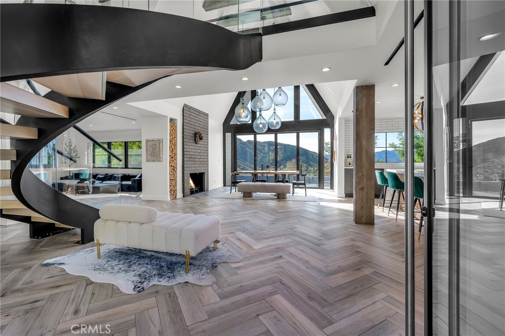 24301 Sylvan Glen Road Calabasas, CA 91302 - Photo 7 of 64 a lobby with furniture and a floor to ceiling window