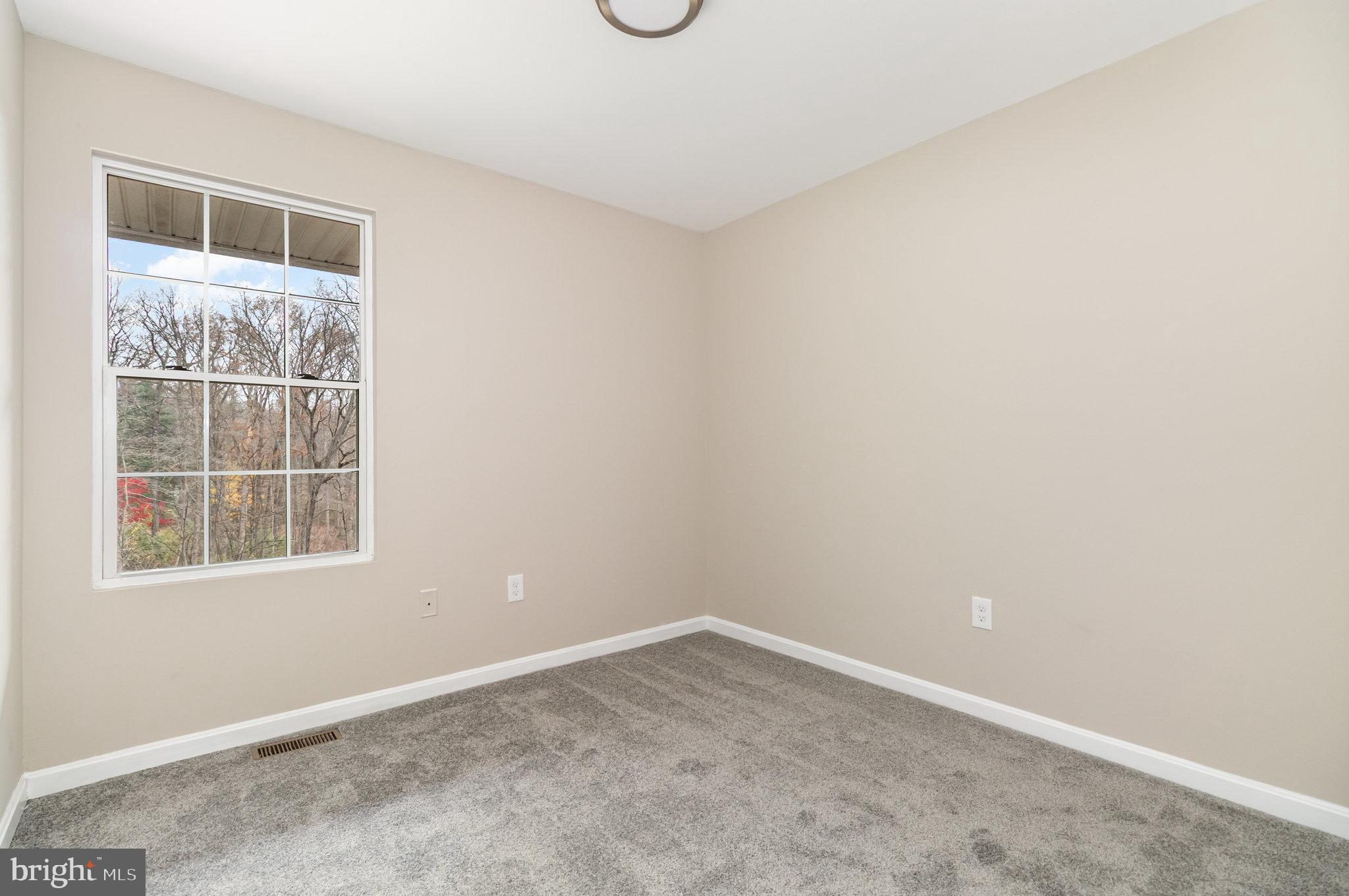 375 Meadow Trail Delta, PA 17314 - Photo 12 of 22 an empty room with a window