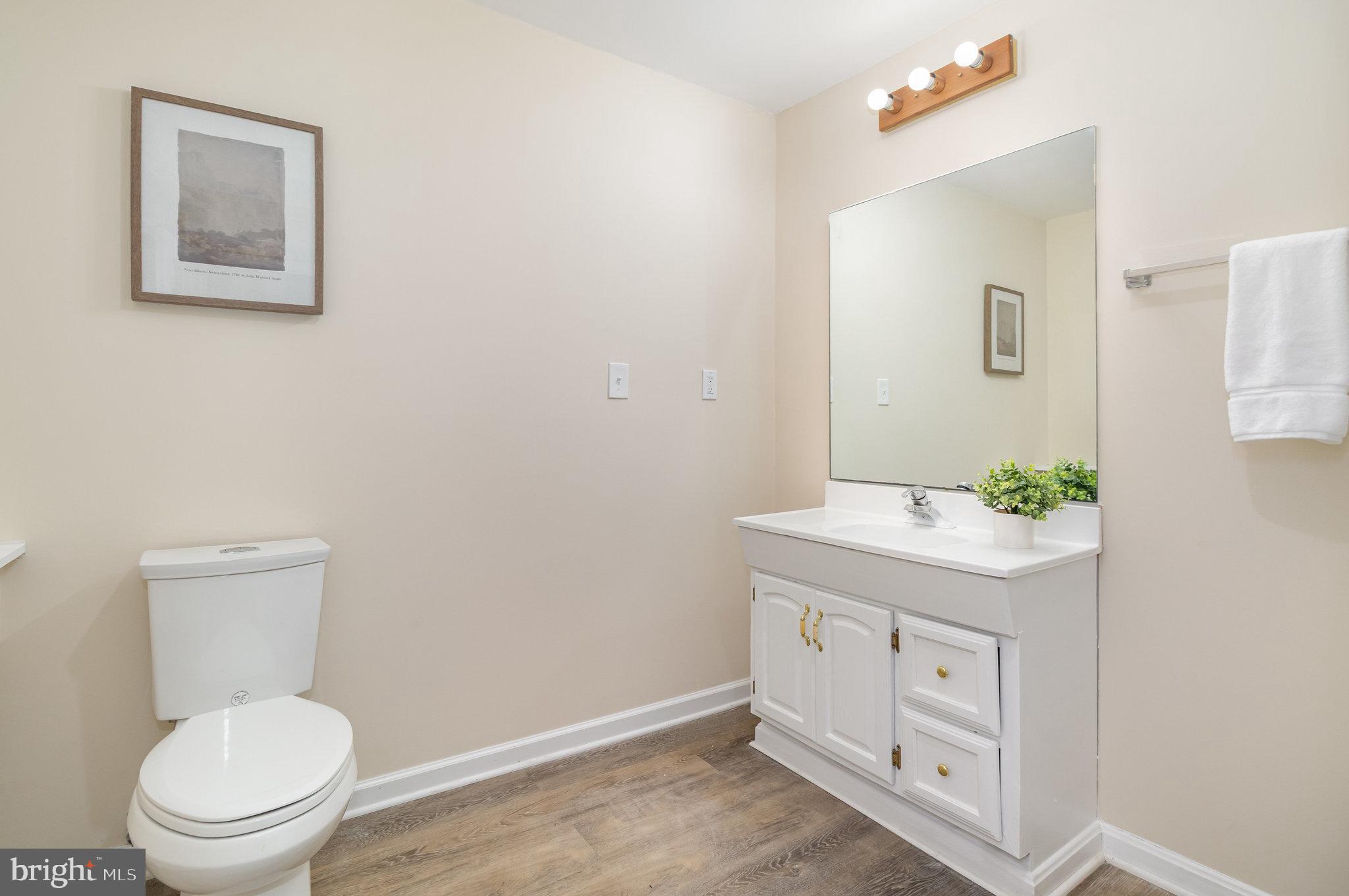 375 Meadow Trail Delta, PA 17314 - Photo 13 of 22 a bathroom with a granite countertop toilet sink and mirror