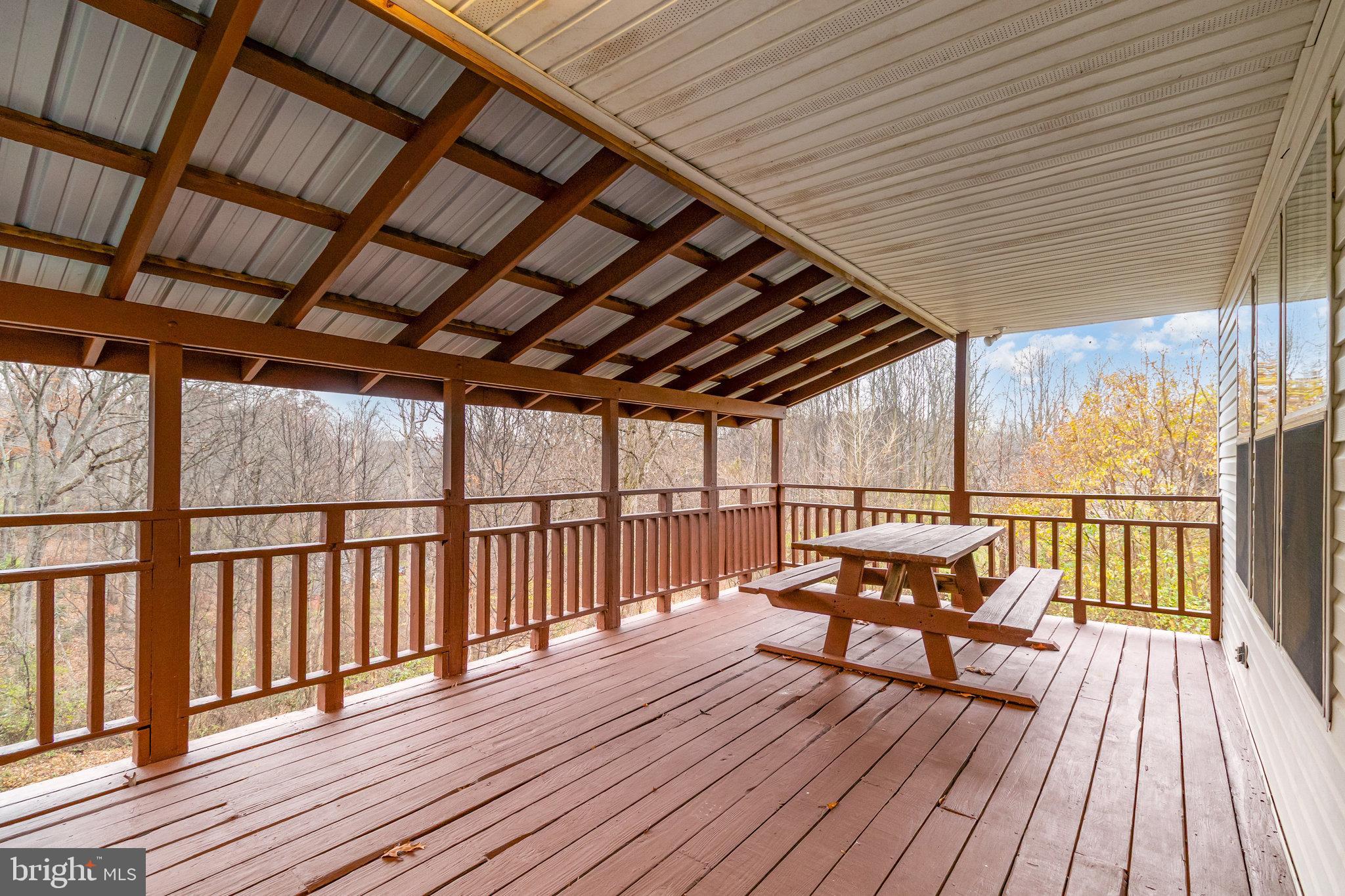 375 Meadow Trail Delta, PA 17314 - Photo 15 of 22 a view of chairs on wooden deck