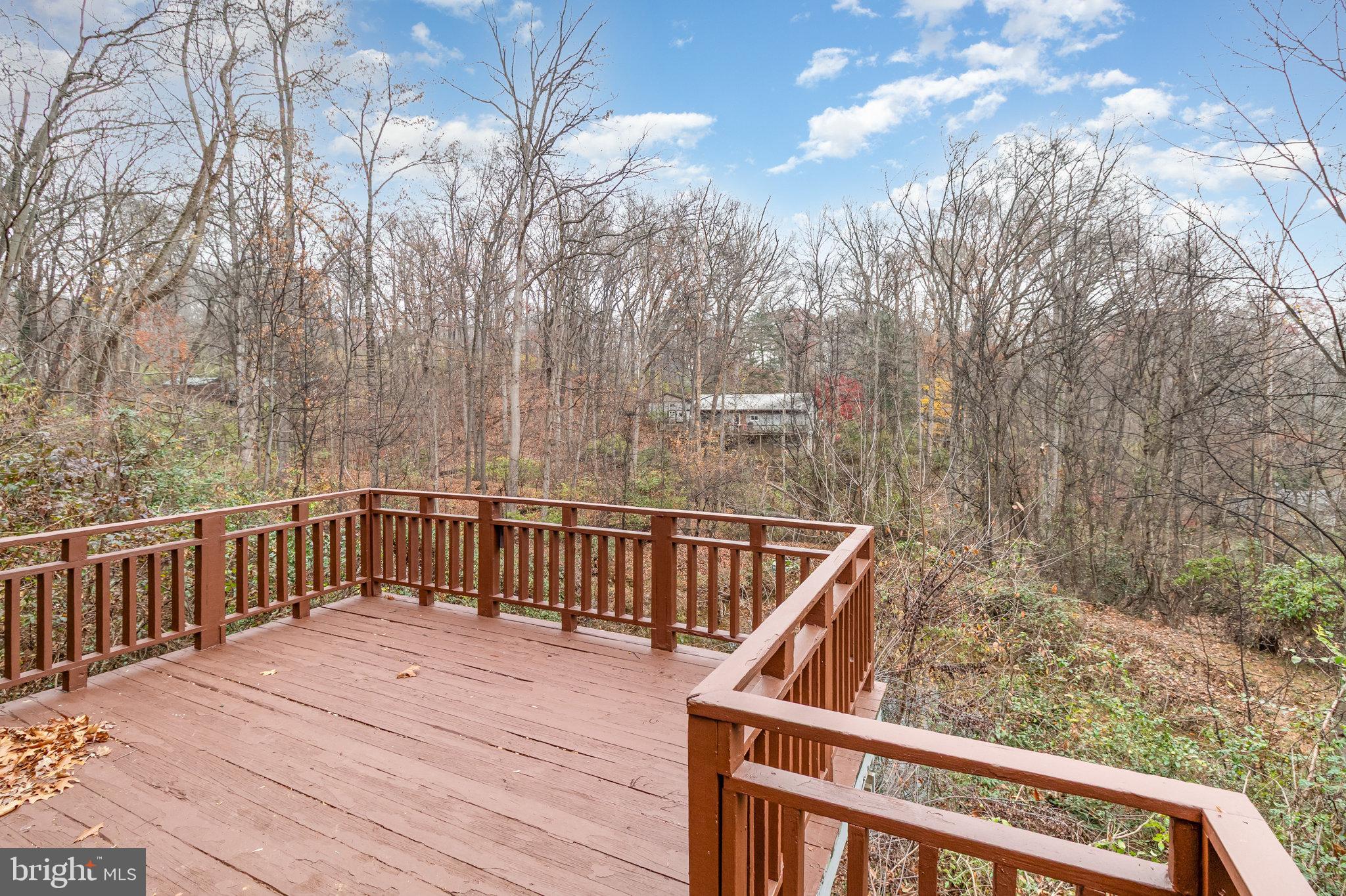 375 Meadow Trail Delta, PA 17314 - Photo 17 of 22 a view of deck with wooden floor and fence