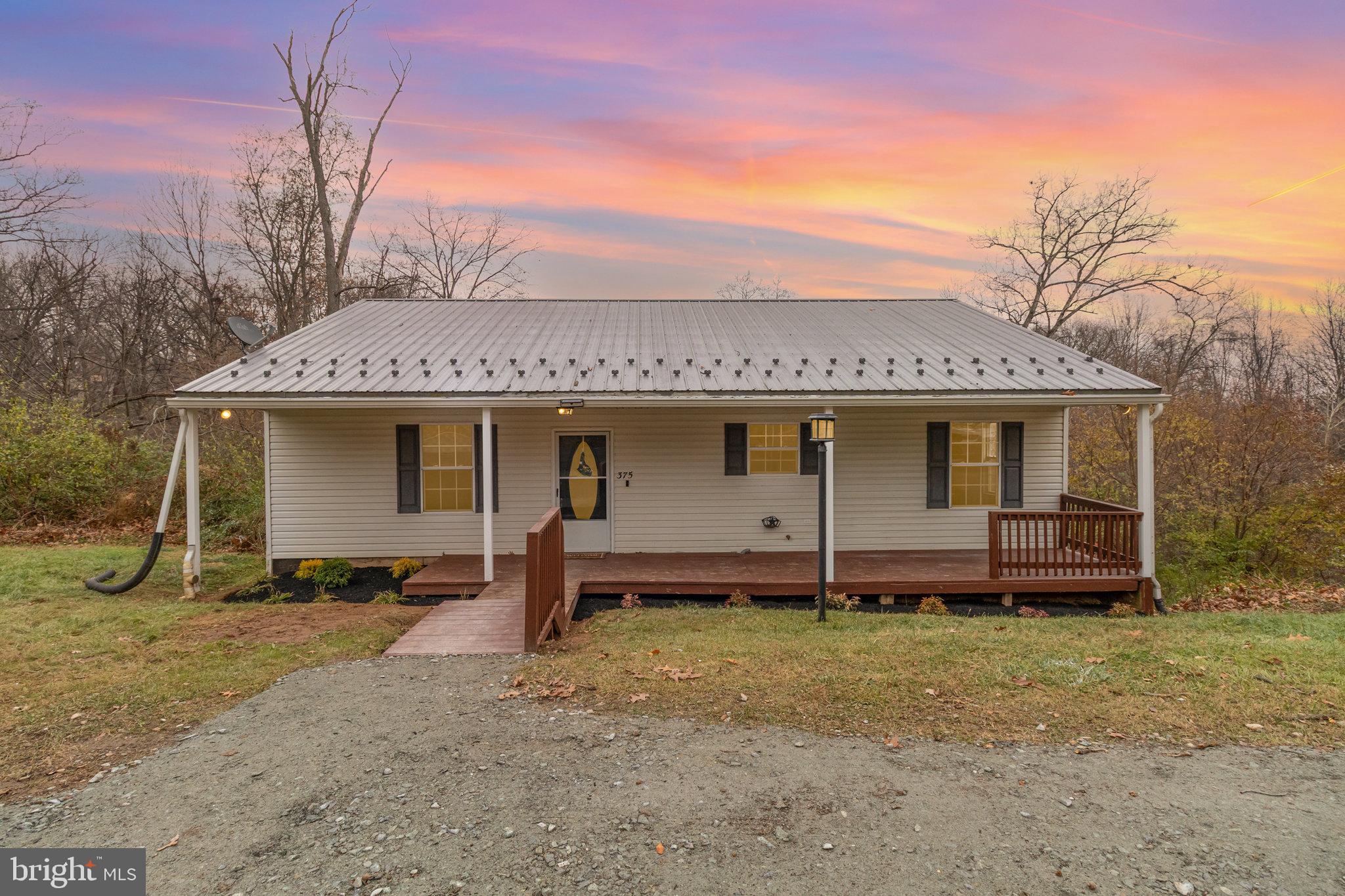 375 Meadow Trail Delta, PA 17314 - Photo 21 of 22 front view of a house with a yard