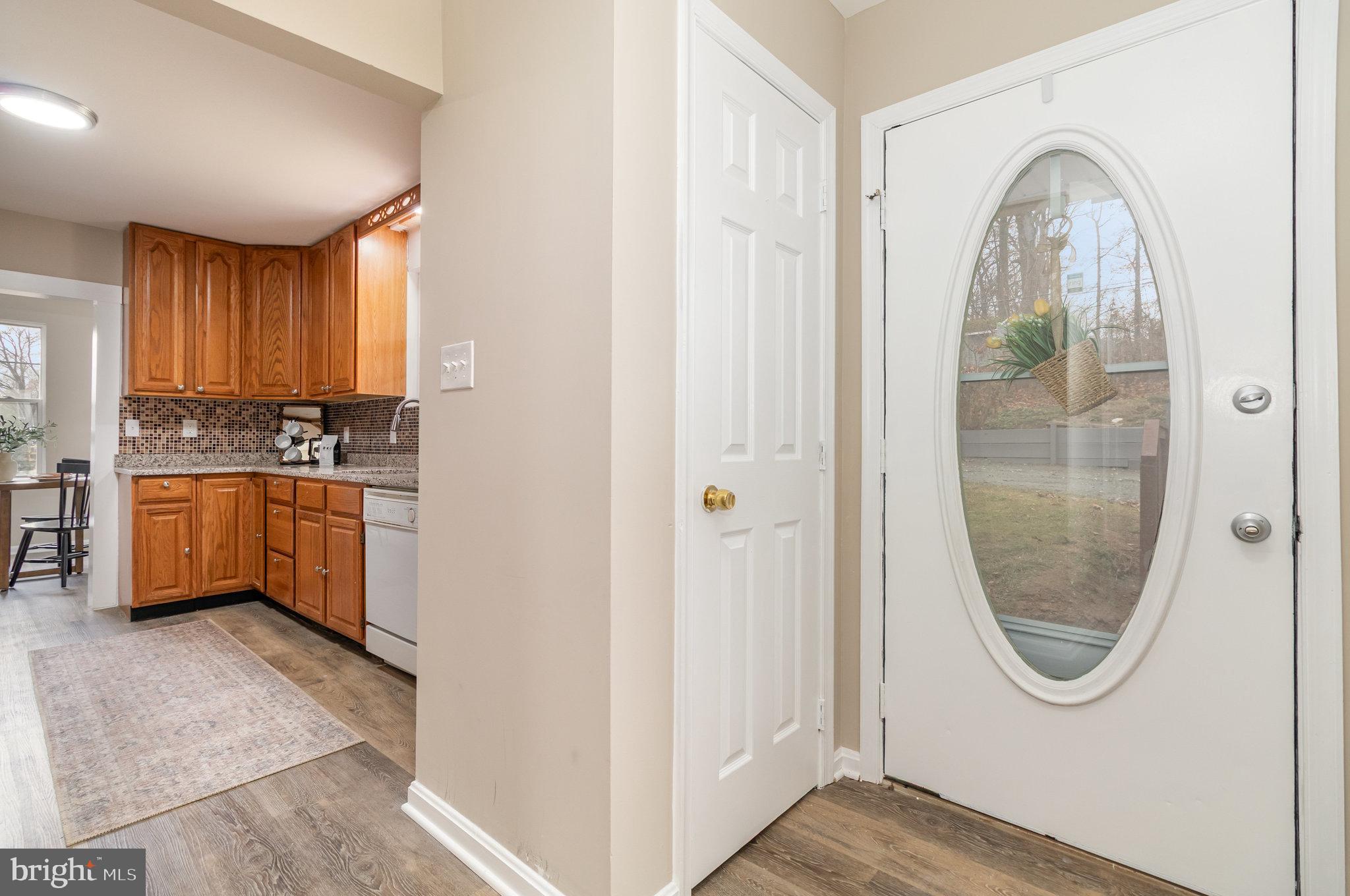 375 Meadow Trail Delta, PA 17314 - Photo 22 of 22 a view of a kitchen with wooden floor and a window