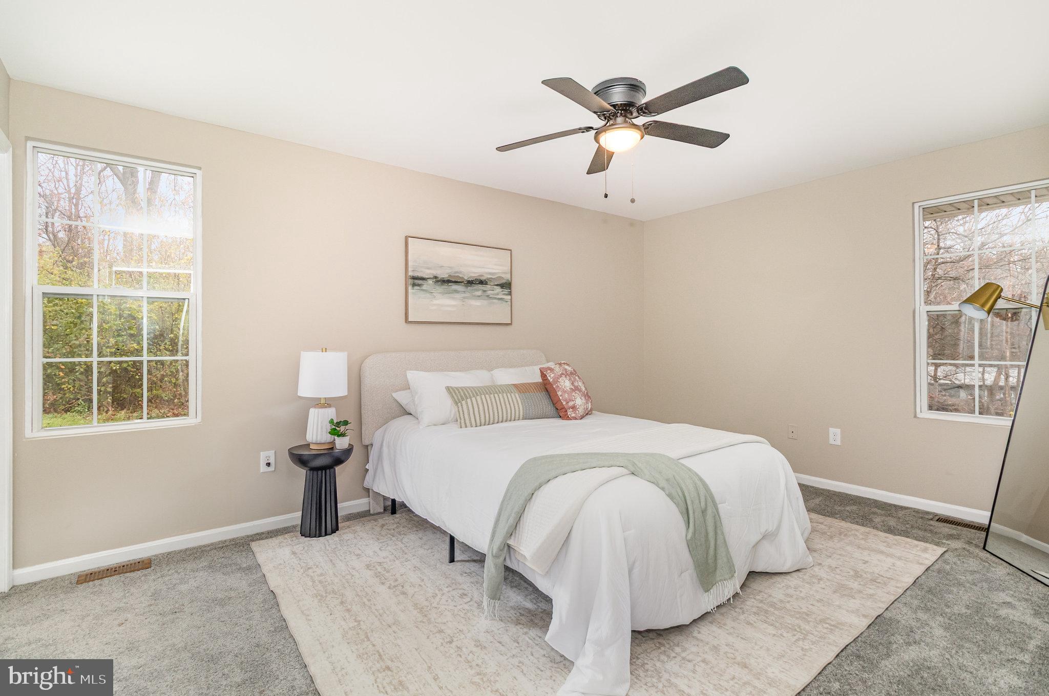 375 Meadow Trail Delta, PA 17314 - Photo 6 of 22 a bedroom with a bed and a large window