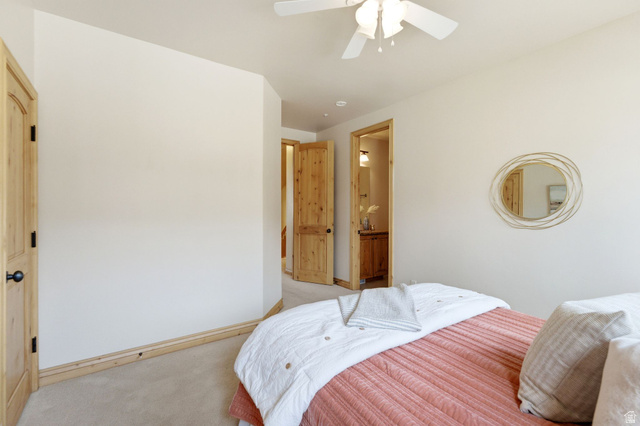 3026 Lower Saddleback Road Park City, UT 84098 - Photo 40 of 71 Carpeted bedroom featuring ceiling fan and connected bathroom