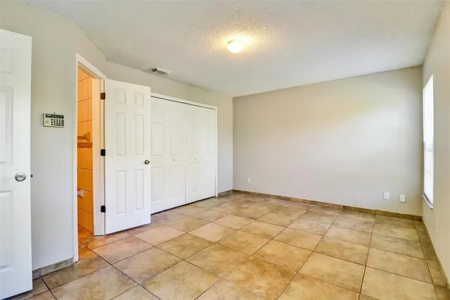 a view of an empty room with window