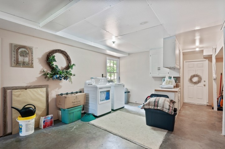 4039 Arno Road Franklin, TN 37064 - Photo 36 of 58 a living room with furniture and a fireplace