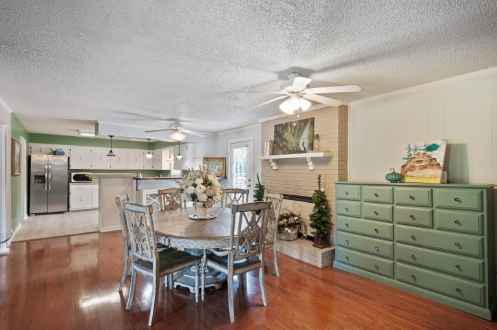 4039 Arno Road Franklin, TN 37064 - Photo 9 of 58 a view of a dining room with furniture and wooden floor
