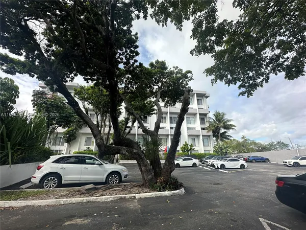 a view of street with parked cars