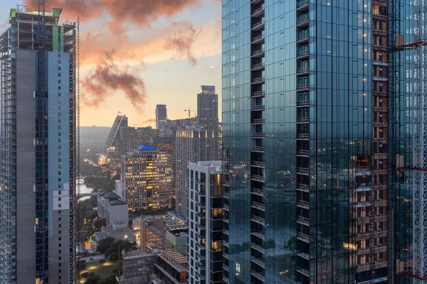 a city view with tall buildings