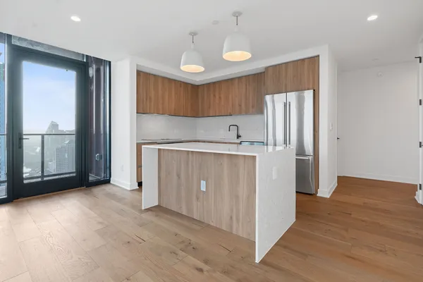a view of a kitchen with a sink