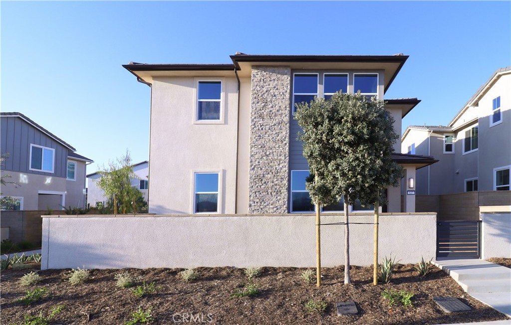 647 Gadwall Irvine, CA 92618 - Photo 1 of 29 a front view of a house