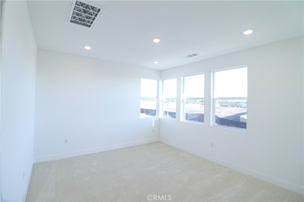647 Gadwall Irvine, CA 92618 - Photo 12 of 29 a view of an empty room with a window