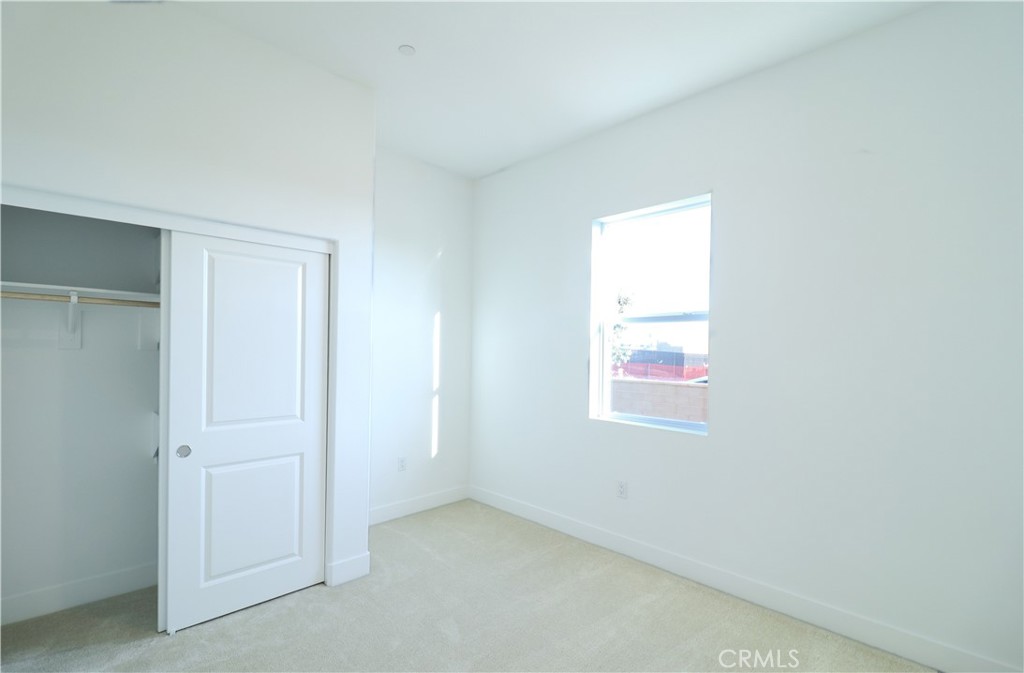 647 Gadwall Irvine, CA 92618 - Photo 9 of 29 an empty room with windows