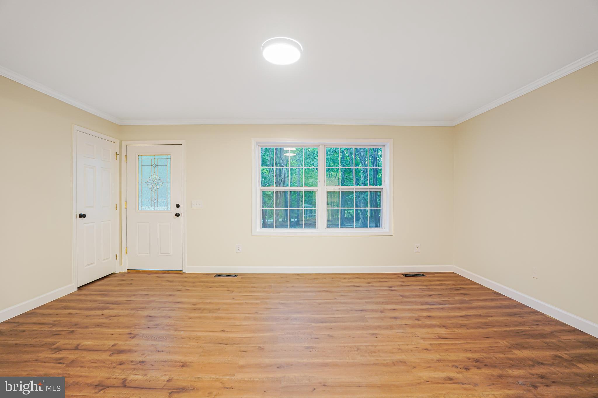 767 Loving Road Zion Crossroads, VA 22942 - Photo 17 of 33 wooden floor in an empty room