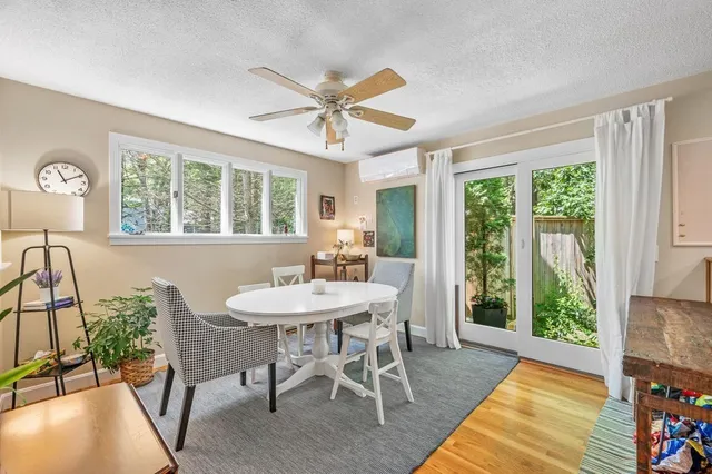 a view of a dining room with furniture window and outside view