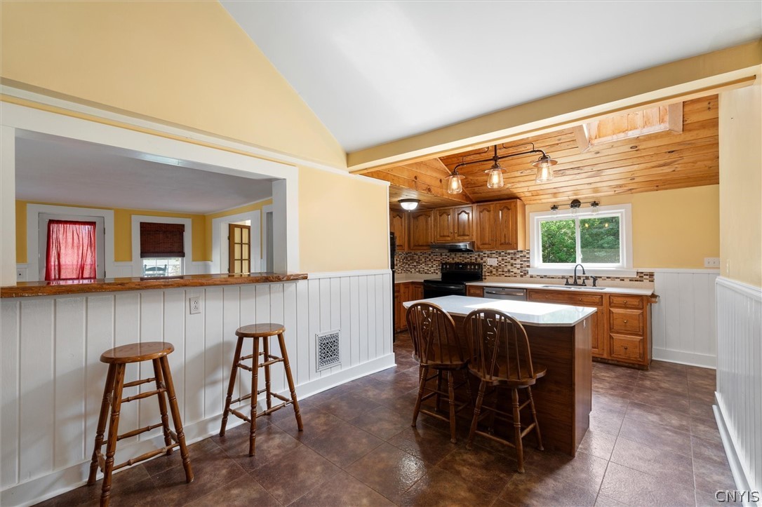 305 Howard Road Volney, NY 13069 - Photo 15 of 49 Island kitchen, bar seating.