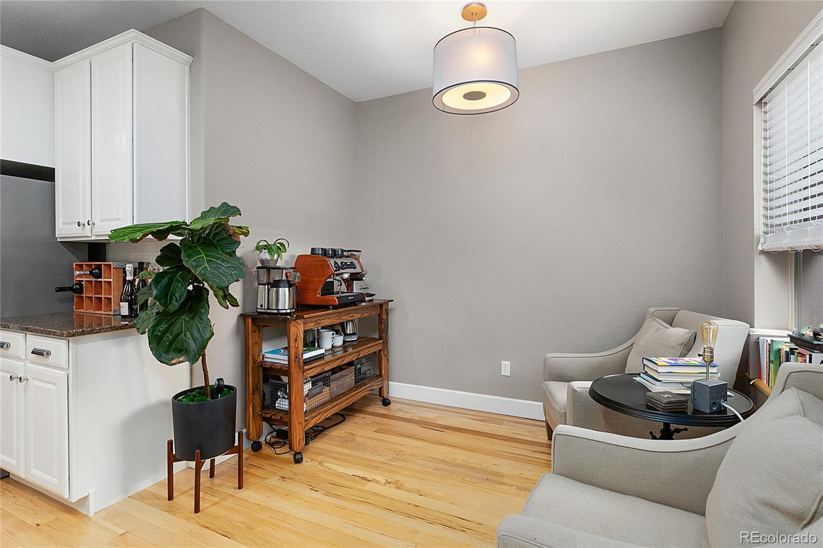 4511 Perry Street Denver, CO 80212 - Photo 11 of 36 a living room with furniture and a window