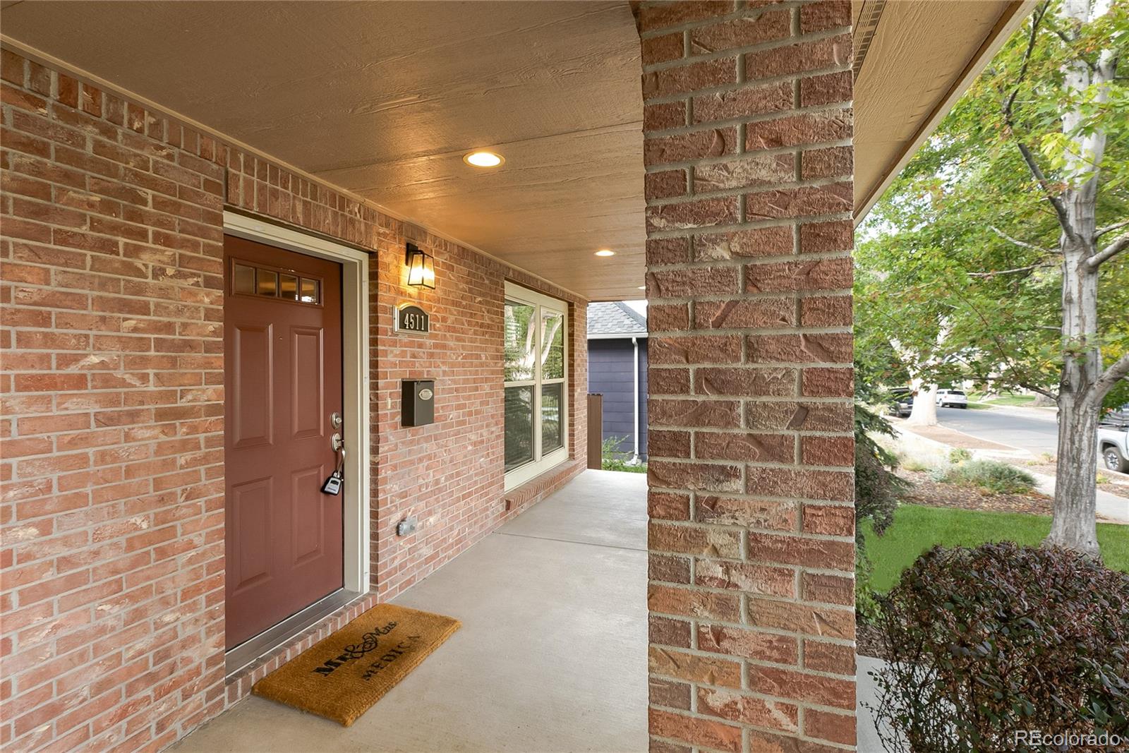 4511 Perry Street Denver, CO 80212 - Photo 3 of 36 a bathroom with a shower