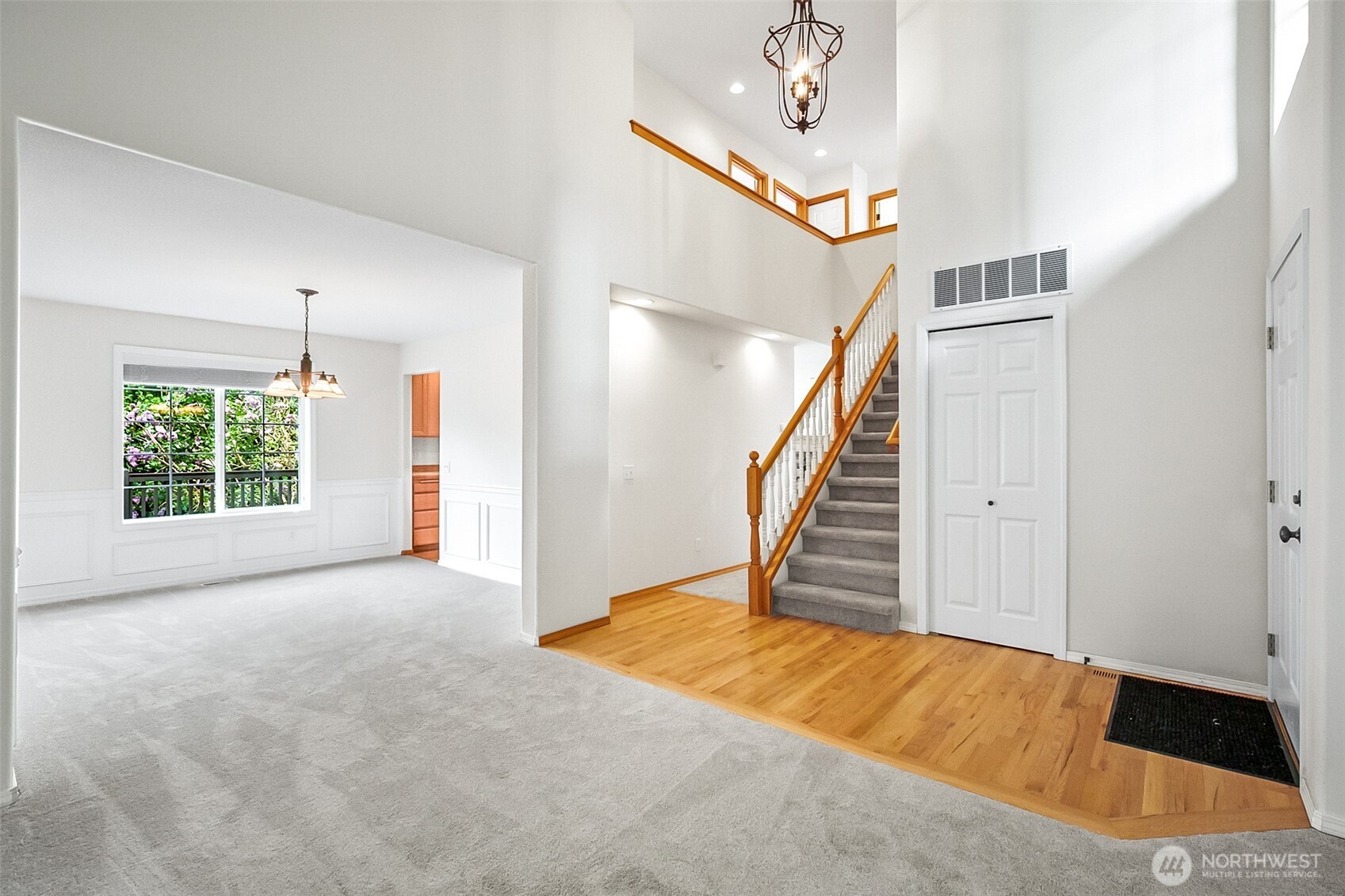 18410 11th Drive Southeast Bothell, WA 98012 - Photo 6 of 40 a view of empty room with wooden floor and stairs